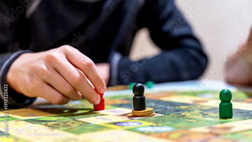 Young man playing a board game