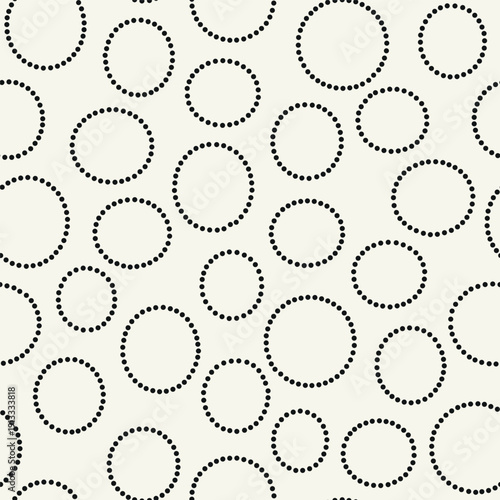 Vector seamless pattern. Rounded dotted organic shapes. Stylish smooth elements. Natural dotted rings. Hand made abstract background. Can be used as a swatch. Monochrome smooth spotty print.