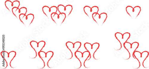 A collection of red and pink heart shapes on a white background