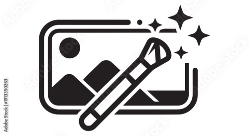 Black and white icon of a paintbrush editing a photo with sparkles, symbolizing digital art and image retouching.