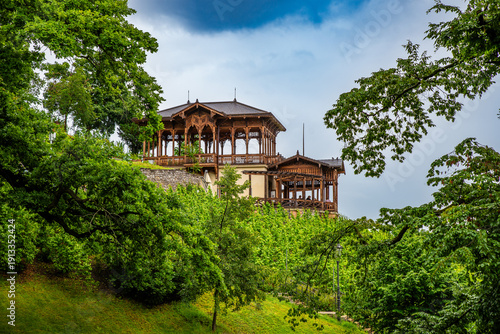 Prague, Czech republic - June 6, 2025. Wooden gazebo Grebovka above wine yard