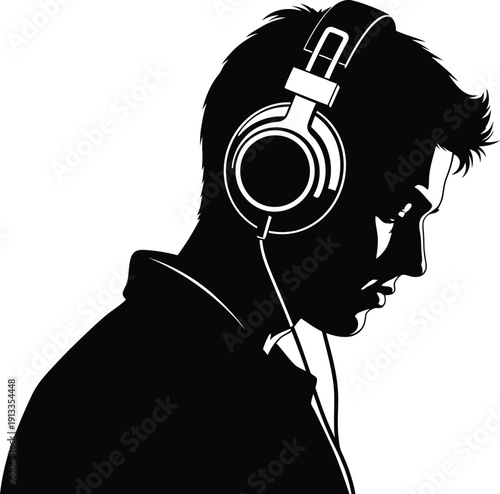Man wearing headphones deeply focused on listening to music with a profile view silhouette