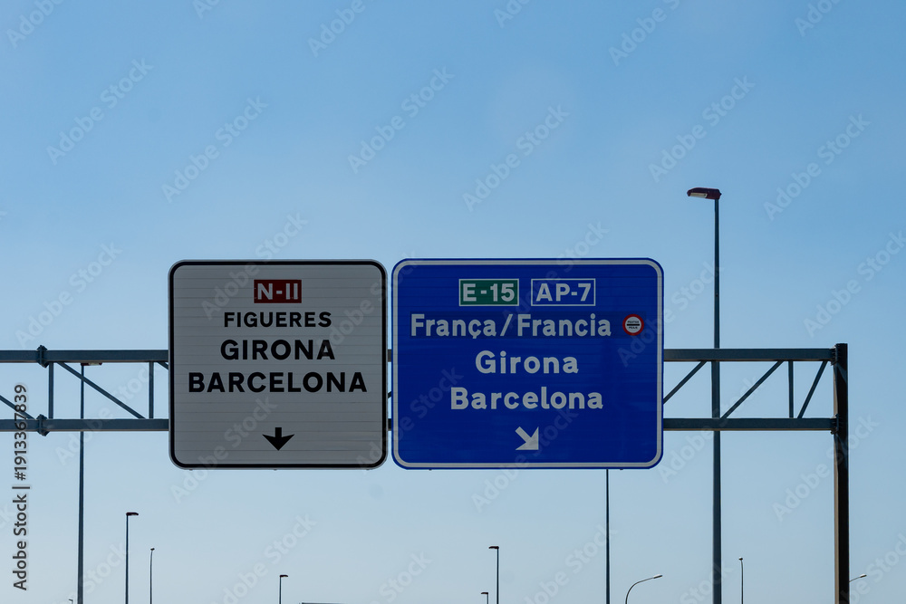 Obraz premium Driving on high-speed highways in southwestern France, road signs A9 motorways, border of Spain, connecting cities and regions, heavy traffic jam in summer