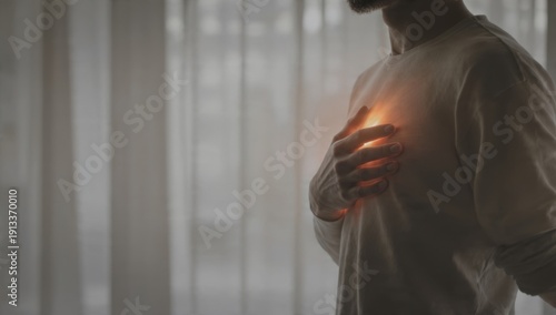 Man with chest pain or heartburn