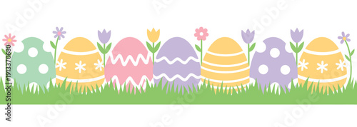 Colorful Easter Eggs and Flowers in Grass