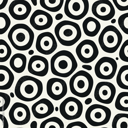 Vector seamless pattern. Free form organic shapes. Stylish smooth elements. Natural dotted rings. Hand made abstract background. Can be used as swatch. Monochrome smooth spotty print.