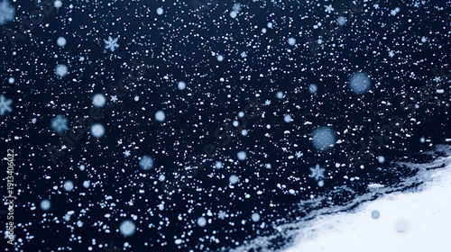 Snowflakes settle on the ground in a vast expanse of black, peaceful, cold