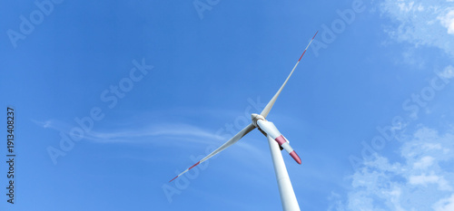 Side View of Windmill or Wind turbine generator for eco energy in power plant