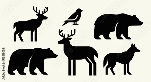 Collection of Silhouetted Forest Animals Including Deer Bears Birds and Wolf.