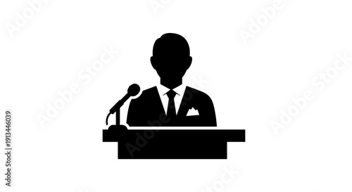 Man in suit at podium 2.
