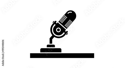 Microphone on a stand icon.