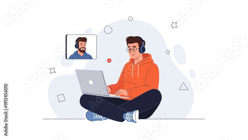 Young man in headphones video calling on laptop, online communication and collaboration