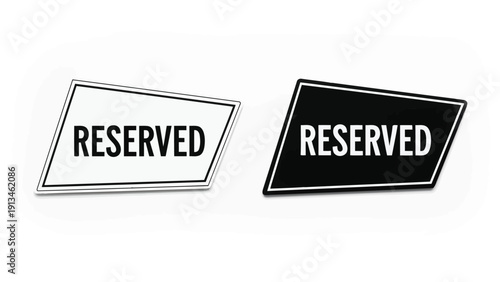 Two angled signs display the word reserved in contrasting black and white color schemes