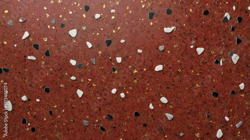 A terrazzo red surface with a polished concrete look, blending marble and granite chips to create a smooth, decorative texture. Ideal for floors, walls, and modern interior finishes.