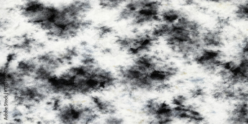 Abstract black and white cloudscape texture captures the beautiful light and dark atmosphere of a bright summer sky
