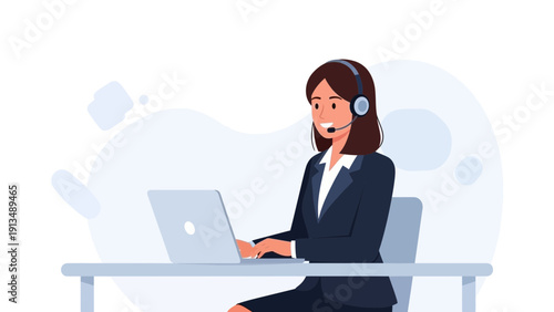 Customer service representative with headset working on laptop at desk