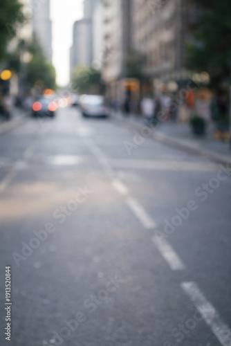 Wallpaper Mural Soft focus downtown street with empty lane and blurred city buildings and traffic bokeh creating modern urban commute background with copy space for transportation technology and lifestyle concepts Torontodigital.ca