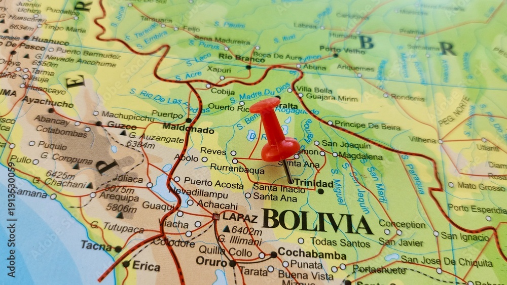 Naklejka premium View of Trinidad, officially La Santisima Trinidad, is a city in Bolivia, capital of the department of Beni, on a geographical map of America, marked with red push pin
