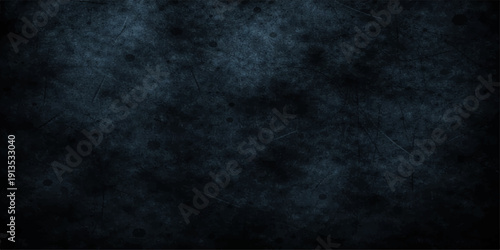 Dark blue grunge texture with smoke and light patterns over a black and white space backdrop creates a vintage night sky storm design for a blank wallpaper wall