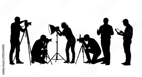 Photographers and videographers working together on a photoshoot with various equipment and camera angles.