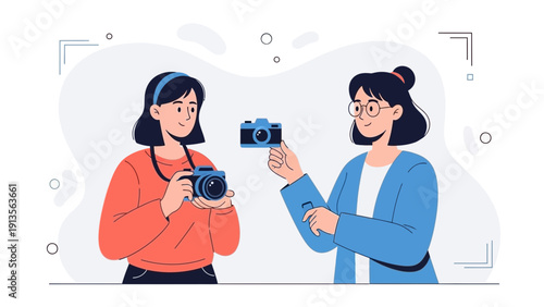 Two women with cameras, photography concept, learning and sharing