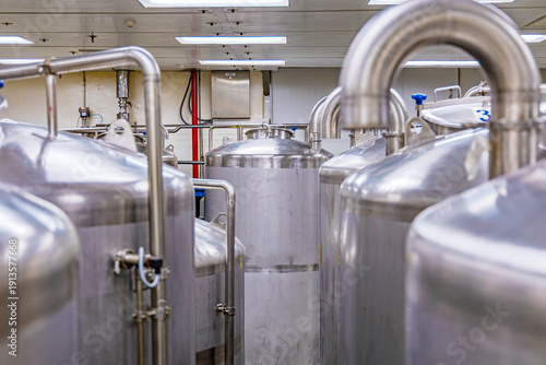 Stainless shiny steel pipes, tanks for the cream cosmetic industry cleaning