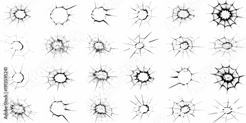 Collection of shattered glass cracks and bullet hole impacts on white