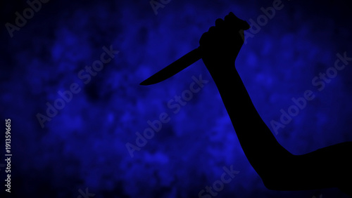Canvastavla silhouette of hand holding knife preparing to stab on blue background