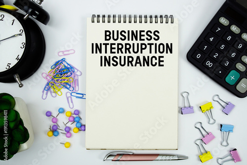 Cuadro en lienzo Business Interruption Insurance text written on notepad with calculator and alar