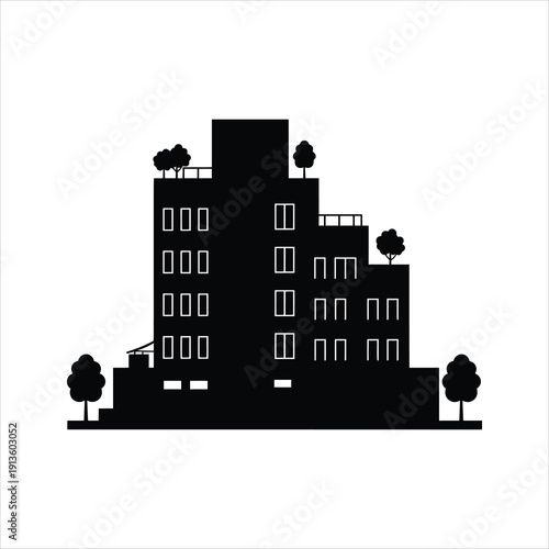A silhouette of a modern building with multiple floors and trees on the rooftop and sides