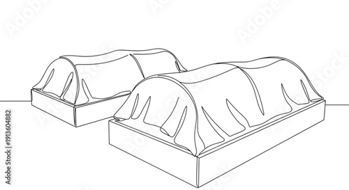 Raised garden beds covered with frost cloth on white background  