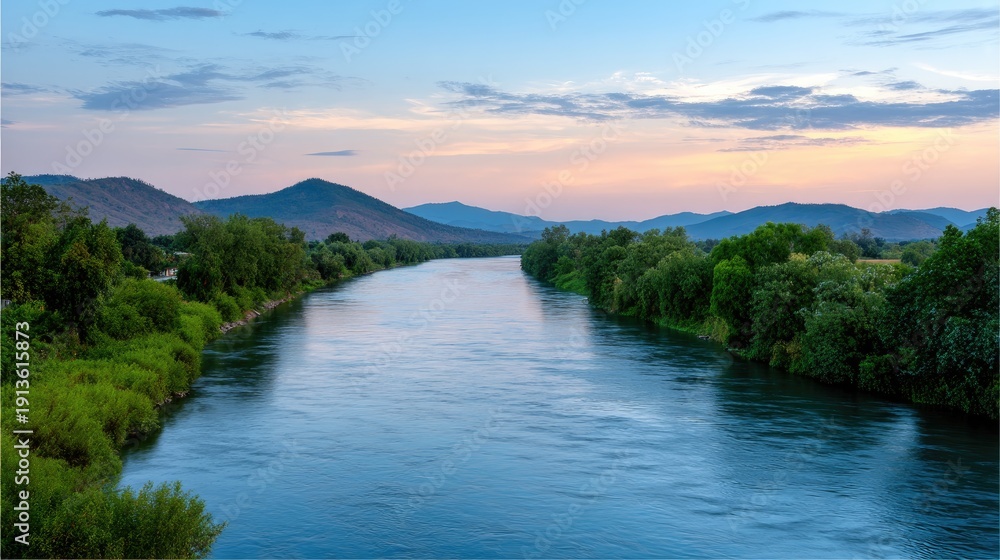 Naklejka premium Peaceful River Landscape at Dusk with Lush Greenery and Serenity of Nature Under a Beautiful Sky with Soft Clouds and Gentle Reflective Water Surface