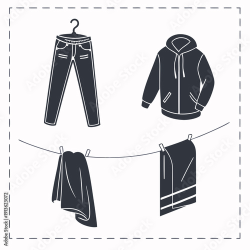 A hoodie, pants and shorts on a clothesline