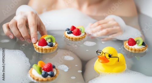 Woman relaxing in bubble bath with desserts and rubber duck.