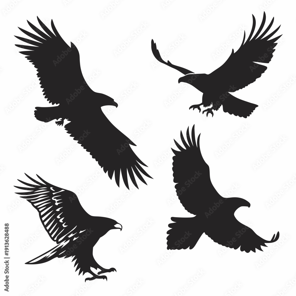 Obraz premium Four black silhouettes of flying birds on white background