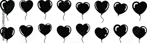 Numerous black heart-shaped balloon silhouettes with strings balloons love