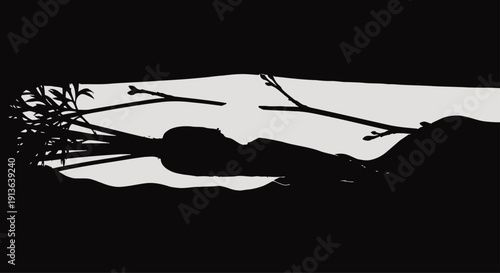 A stark silhouette of an orange carrot, partially obscured by a thin branch, with a hint of sunlight illuminating the top.