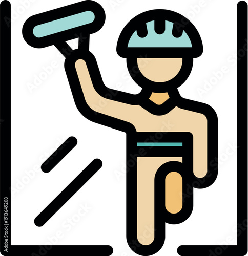 Industrial climber cleaning windows using squeegee and wearing safety helmet