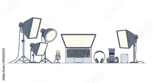 Professional video production setup featuring an open laptop, studio lights, microphone, headphones, camera, and external hard drive.