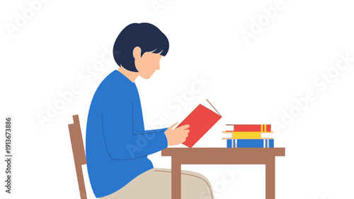 Student Reading Book at Desk with Stack of Books