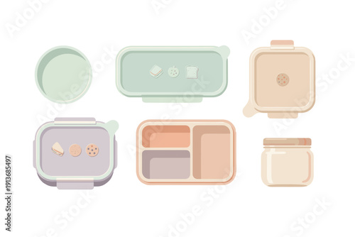 Various lunch containers and a jar with snacks displayed on a table