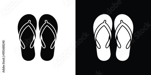 Pair of black and white flip flops on contrasting backgrounds