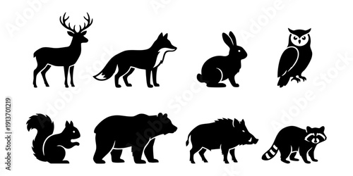 Collection of forest animals silhouetted against a plain background viewed from the side