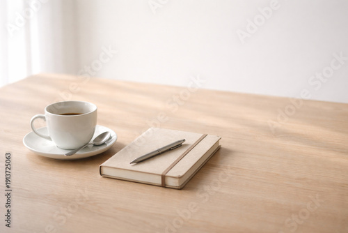 Minimal table scene with subtle signs of recent use, suggesting human presence without showing people.