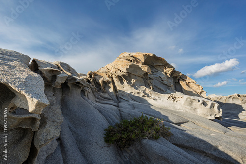 Bizarre and unique rock formations and shapes at the Kolymbithres Beach on Paros island in Greece on a sunny day.