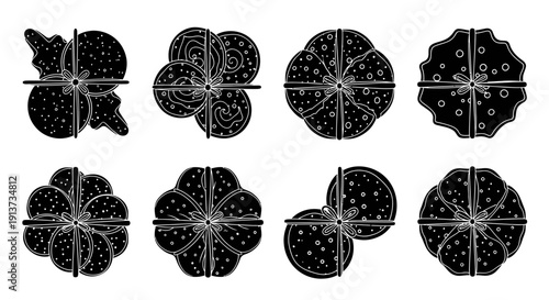 Eight black and white floral designs with intricate patterns on white background