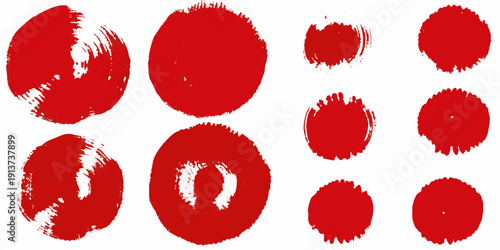 Abstract red brush strokes and circular shapes against a white background