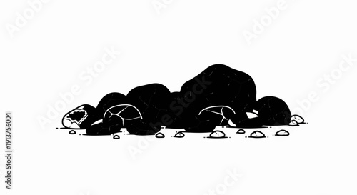 Black cracked rocks piled on small stones with white accents