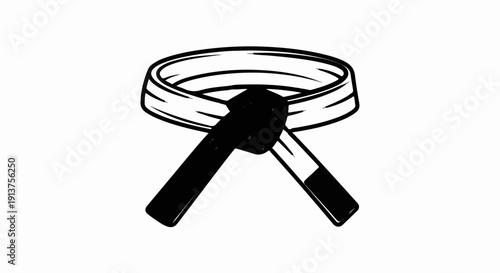 Black martial arts belt tied in a knot, symbol of dedication