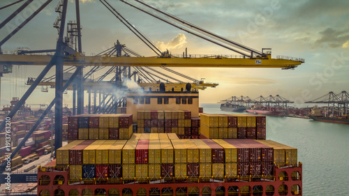 Obraz na plátně Aerial view Container cargo ship loading unloading container import export sea port, Global trade business container cargo ship freight shipping commercial trade logistic transportation international